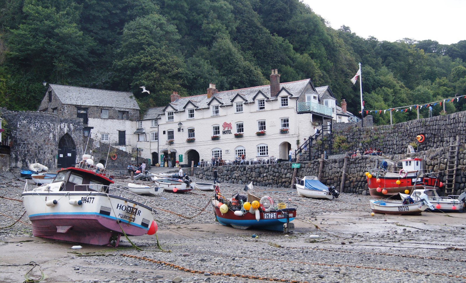 Boats on the sand at low tide in Clovelly harbour