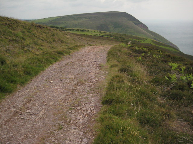The South West Coast Path crossing open heathland on Holdstone Down, on the Exmoor coast of North Devon