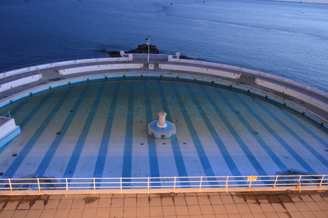 Tinside Lido, the Art Deco saltwater swimming pool at the foot of Plymouth Hoe, with Plymouth Sound beyond