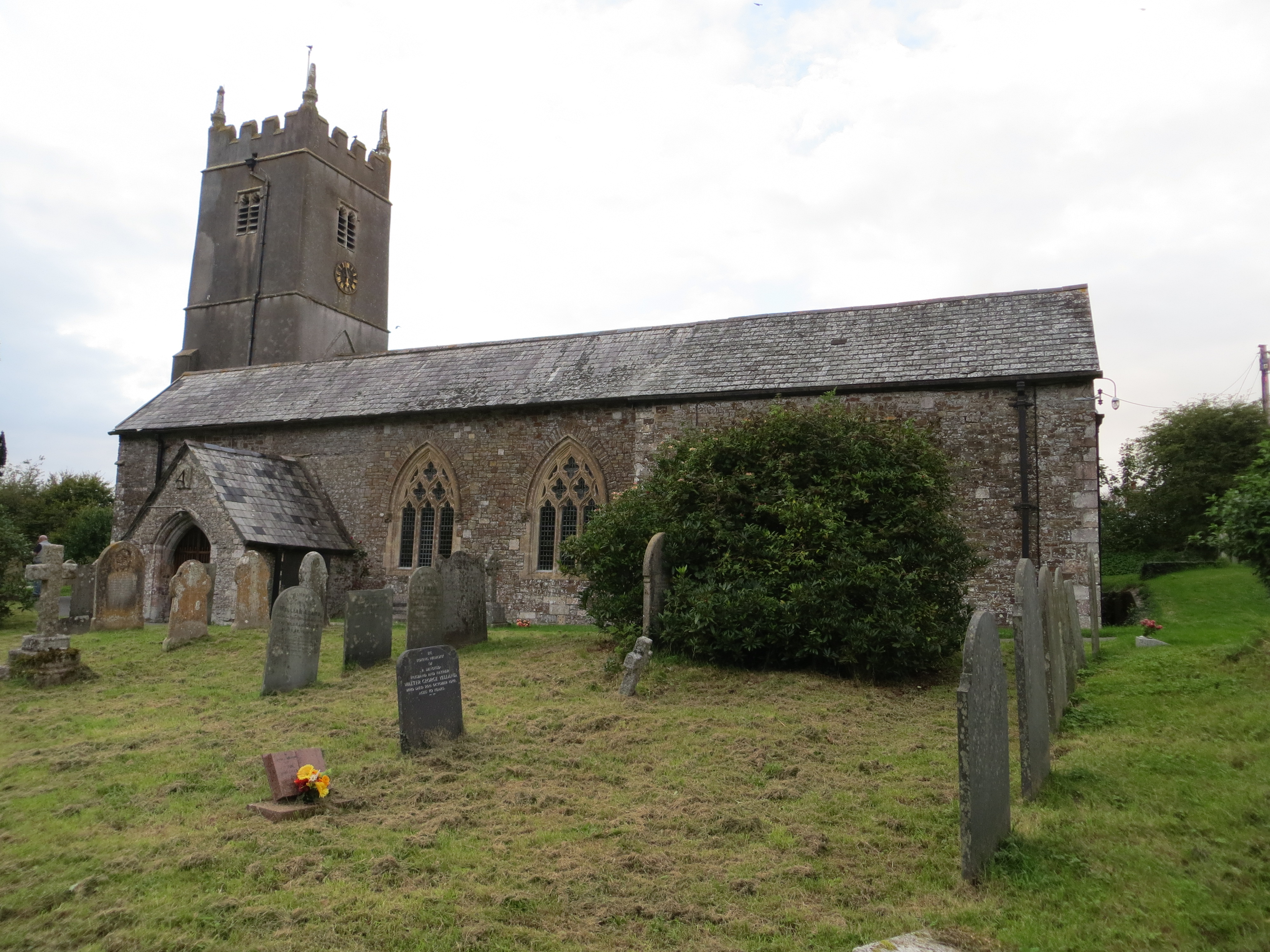 The church of St Michael at Shebbear, Devon, whose green is home to the Devil's Stone